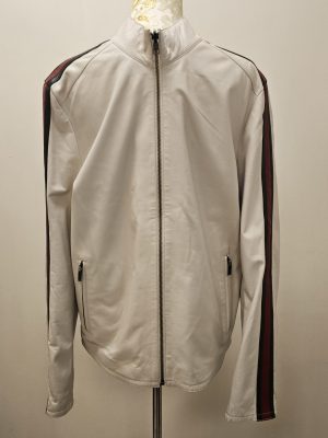 REVERSIBLE CON LISTAS EN MANGAS BEIGE