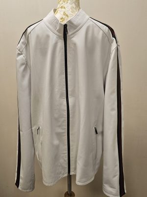 REVERSIBLE CON LISTAS EN MANGAS BLANCO